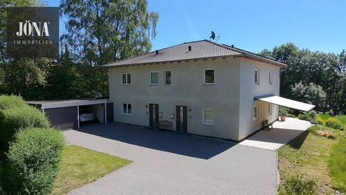 Drohne - KfW-55-Einfamilienhaus mit Einliegerwohnung und großzügigem Grundstück