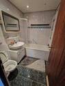 Badezimmer mit Badewanne - 
