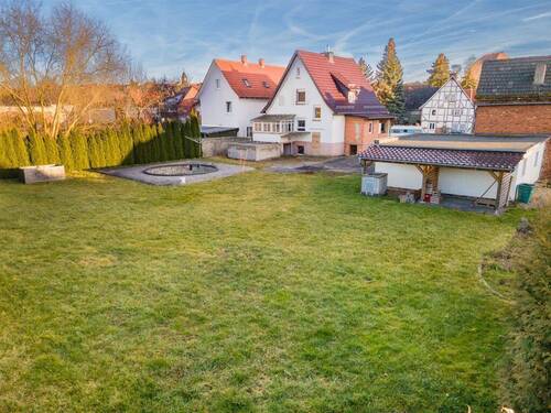 Gartenansicht - Einfamilienhaus mit 100,00 m&sup2; in Eschwege zum Kaufen