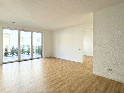 Wohnzimmer - Elegante 2-Zimmer-Neubauwohnung mit Terrasse auf ca. 61,25 m².