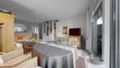 Wohnzimmer - Beispielfoto, Ausstattung und Zustand können variieren - 2 Zimmer Etagenwohnung in Münster