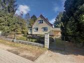 Haus straßenseitig - Charmantes Einfamilienhaus mit großem Grundstück in Schulzendorf