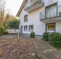 Menden Platte Heide – ETW im UG mit sep. Hauseingang, Terrasse, Garten & Carport