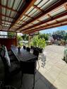 überdachte Terrasse - 