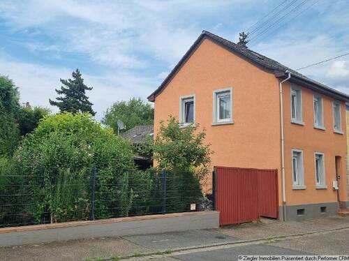 01 Außenansicht Straßenseite - Geräumige Doppelhaushäfte mit idyllischem Garten in Edingen-Neckarhsn., OT-Neckarhausen - 10003989