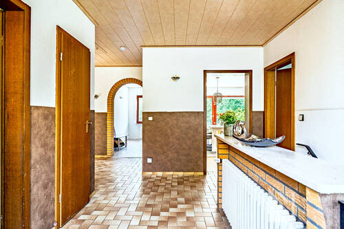 Flur im Eingangsbereich - Bungalow mit 110,00 m² in Brietlingen zum Kaufen