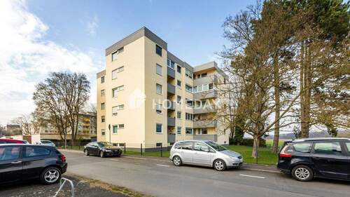 Außenansicht 3 - Gemütliche 2,5-Zimmer-Wohnung mit Wintergarten, Aufzug und guter Lage in Karben-Okarben