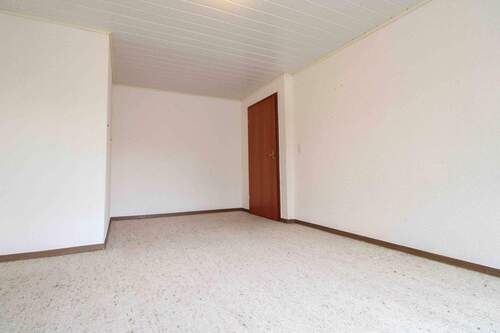 Wohnzimmer EG - 6 Zimmer Einfamilienhaus in Grävenwiesbach