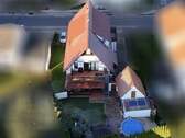 Drohnenaufnahme - Mehrfamilienhaus, Wohnhaus mit 237,00 m&sup2; in Lübbecke zum Kaufen