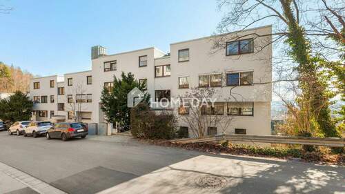 Außenansicht 1 - 3,5-Zimmer-Terrassenwohnung mit Panoramablick und Garage in ruhiger Hanglage