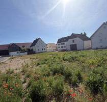 Bauplatz in Großrinderfeld - 180.000,00&nbsp;EUR Kaufpreis, ca.&nbsp; 0,00&nbsp;m&sup2; in Großrinderfeld (PLZ: 97950)