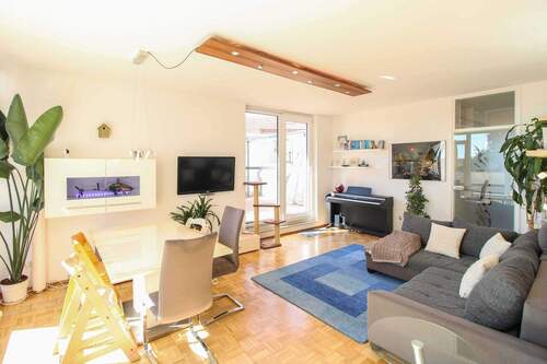 Wohnzimmer - Etagenwohnung mit 142,30 m&sup2; in Putzbrunn zum Kaufen