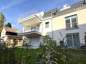 Gartenansicht - Bezugsfertige 4-ZKBB Neubauwohnung mit Lift im 1. OG