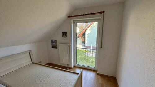 Schlafzimmer im Dachgeschoss - 