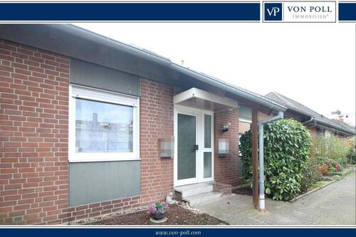 Titelbild - Gepflegtes Zweifamilienhaus mit separaten Wohneinheiten, Garten und Garagen