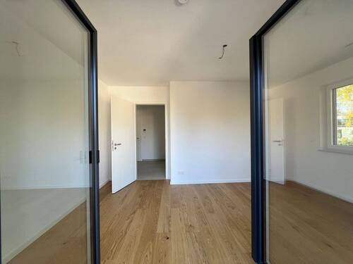 Schlafzimmer mit Balkon - 