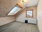 Zimmer im Dachgeschoss - 