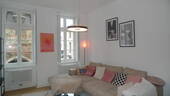 Wohnzimmer - Sanierter Altbau - 2 Zimmer mit EBK und Terrasse - alte Buchdruckerei -