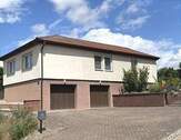 Einfahrt und Garagen - Einfamilienhaus mit 102,00 m² in Roßleben zum Kaufen