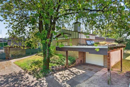 Carport mit vorgelagerter Stellmöglichkeit - befahrbar über Rückwärtige Zufahrt - 4 Zimmer Bungalow zum Kaufen in Rheine