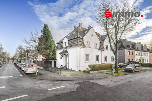 Titelbild mit Logo - 5 Zimmer Mehrfamilienhaus, Wohnhaus zum Kaufen in Eschweiler