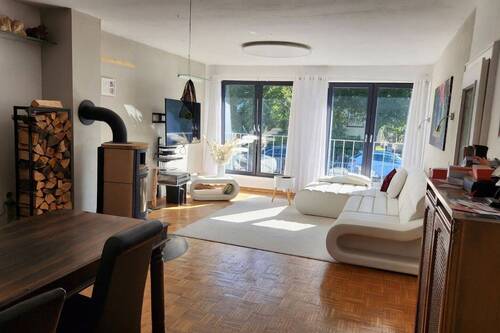 Wohnzimmer mit Fensterfront - Einfamilienhaus mit 206,00 m² in Maintal zum Kaufen