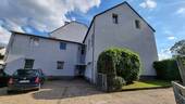 Seitenansicht - 1 Zimmer Mehrfamilienhaus, Wohnhaus zum Kaufen in Hilden
