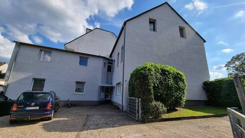Seitenansicht - 1 Zimmer Mehrfamilienhaus, Wohnhaus zum Kaufen in Hilden