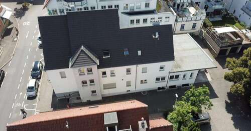 Ansicht - Mehrfamilienhaus mit 7 Wohnungen und Ladengeschäft in Besigheim am Bahnhof zu verkaufen!