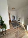 Heller Flur mit Pflanzen - 