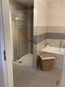 Bad mit Dusche und Wanne - 