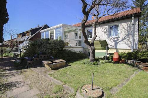 Garten - Familienfreundliches, bezugsfreies Einfamilienhaus mit großem Garten und beheiztem Wintergarten