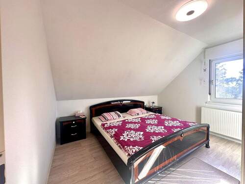 Schlafzimmer im Dachgeschoss - 