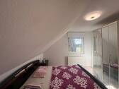 Schlafzimmer im Dachgeschoss - 