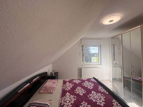 Schlafzimmer im Dachgeschoss - 