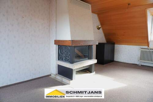 Wohnzimmer im Dachgeschoss - 4 Zimmer Doppelhaushälfte zum Kaufen in Lingen (Ems)