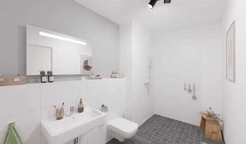 Ein modern gefliestes Badezimmer mit bodengleicher - Etagenwohnung mit 62,90 m² in Hasloh zum Kaufen