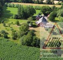 Perfekt für eine Pferdehaltung. Ehemalige Hofstelle mit Wirtschaftsteil, zwei Einliegerwohnungen, Scheune und vier Garagen und arrondierten Fläche - Lienen Holzhausen