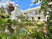 Ihr Bungalow mit Garten & Teich von Süd-Westen - Zeitlos am Zeitlberg! - 1.375.000,00&nbsp;EUR Kaufpreis, ca.&nbsp; 340,00&nbsp;m&sup2;&nbsp;Wohnfl&auml;che