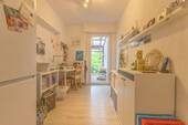 Durchgangszimmer mit Zugang zum Wintergarten - Wohnung im EG - 