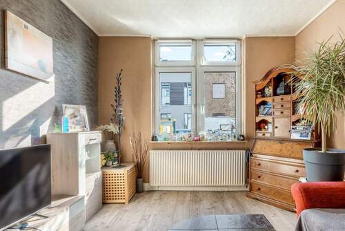 Wohnzimmer im EG - 9 Zimmer Mehrfamilienhaus, Wohnhaus in Bremen