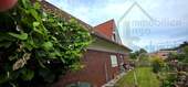 Ostansicht - 8 Zimmer Einfamilienhaus zum Kaufen in Ostrhauderfehn