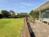 Hausansicht und Garten - 