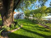 Ansicht vom Garten - Stylische Terrassenwohnung mit Garten direkt am Yachthafen