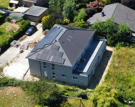 dji_fly_20250701_144918_853_1752057311689_photo_op - Moderne 2 Zi. EG Neubau Wohnung 75 m², OS Eversburg KfW- Förderung, mit Privatgarten, Provisionsfrei, Baufertigstellung Dezember 2025