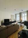 Wohnzimmer mit Essbereich - Ab sofort! Vollmöblierte 3 Zimmer Wohnung in Berlin-Friedrichshain