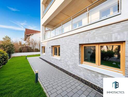 Außenansicht - edle Klinker/Putz-Kombination - KfW-40-Gartenwohnung am Rochusberg - Komfort im Souterrain - Erstbezug