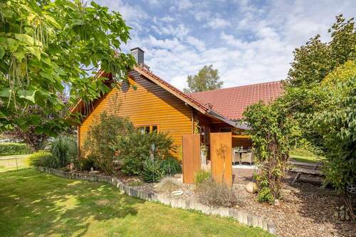 Seitenansicht - Einfamilienhaus mit 156,00 m² in Worpswede / Hüttenbusch zum Kaufen