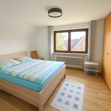 Wohnliches Schlafzimmer mit Blick ins Grüne - 