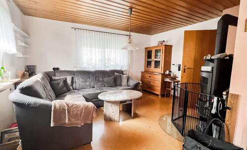 Wohnzimmer - 5 Zimmer Einfamilienhaus zum Kaufen in Satteldorf